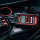 Do you need CAN FD in an OBD2 scanner: a KINGBOLEN Ediag Plus diagnostic device on an engine bay next to the fuse box