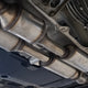Catalyst monitor not ready before an emissions test: dual catalytic converters and exhaust pipes under the car