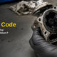 P0401 code and EGR valve: gloved hand holding a carbon-clogged EGR valve